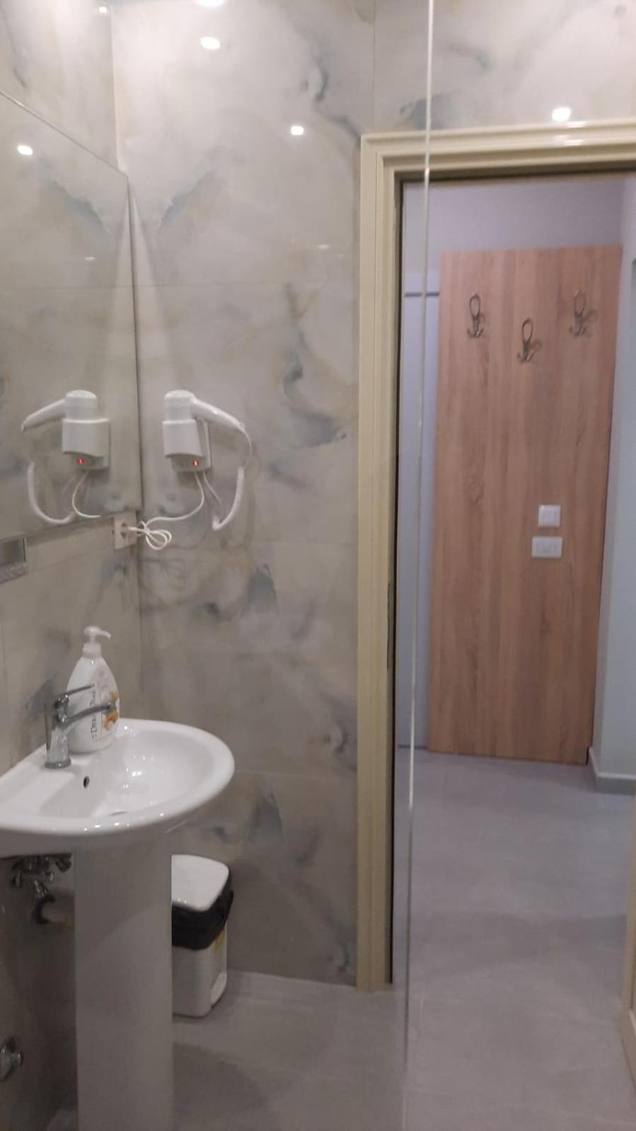Luander Hotel Tirana Quarto foto