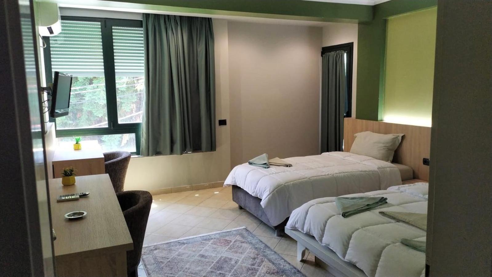 Luander Hotel Tirana Quarto foto